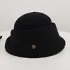 Sombrero de copa negro elegante estilo Hepburn francés para mujer otoño invierno retro muestra cara pequeña ala rizada sombrero de fieltro de lana de socialité sombrero de pescador