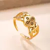 Anillos de Acero Inoxidable Transfronterizos Europeos y Americanos para Mujer, Anillos Fundidos con Forma de Flor con Diamantes, Joyería de Acero de Titanio de Alta Gama, Venta Directa del Fabricante