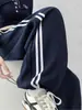 Calça listrada curva de cor contrastante para mulheres, calça longa casual solta de cintura alta para primavera e outono, calça de moletom esportiva de perna larga com forro de fleece espesso para outono e inverno