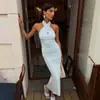 Conjunto de principios de otoño estilo europeo y americano: Diseño de cuello cruzado halter, vestido de hombros descubiertos, sexy y seductor, entallado en la cintura, adelgazante, vestido largo sin espalda