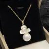 Pendientes de Plata 925 con Aguja, Flor de Esmalte Goteante y Perla, Lujo Accesible, Pendientes de Gama Alta, Conjunto de Colgante de Collar Elegante de Nicho para Mujer