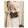 Bolso vintage de gran capacidad transfronterizo para mujer, nuevo bolso cruzado casual versátil de otoño 2026, bolso de hombro de lona para debajo del brazo