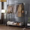 Perchero de pie para dormitorios, simple y fácil de usar, con un diseño reforzado, adecuado para colgar ropa y sombreros, y se puede mover al balcón para secar la ropa