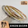 Pulsera de Diamante de Acero de Titanio de Oro de 18 Quilates Transfronteriza para Mujer Remache Sol y Luna Trébol de Cuatro Hojas Corazón Simple Pulsera Pulsera de Alta Gama
