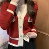 Estilo coreano Otoño Nuevo estilo francés retro Xiaoxiang tejido de punto camiseta interior suelta para mujer suéter corto de punto cárdigan abrigo