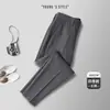 Calças Masculinas Casuais Pretas Slim Retas Cropped Estilo Outono Inverno para Meia-Idade Calças de Terno Casuais com Caimento Calças Longas