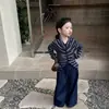 Ropa Infantil Estilo Coreano Nueva Otoño 2026: Cárdigan Rayado Retro Chic para Niña y Pantalones de Mezclilla Rectos de Pierna Ancha