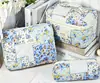 Bolsa Cosmética Portátil Grande Capacidade Floral Pequeno Armazenamento Algodão Acolchoado Portátil Flores Fofas Ins Viagem Estudantes
