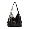 Bolsas retro de alto valor para mujer, gran capacidad, nuevo estilo 2026, mochila casual de un solo hombro, bolsa tote para el trabajo y el día a día