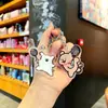 Boneca de cachorro de desenho animado bolsa de boneca pingente de bolsa bolsa mochila de casal pingente de badminton chaveiro atacado