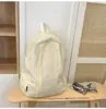 Mochila Pequena Estilo Preguiçoso Ins Coreano de Aparência Sofisticada Leve Cor Pura Simples Repelente à Água Mochila Casual para Viagem