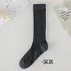 Calcetines de algodón puro para mujer de media pantorrilla estilo fino primavera y verano malla hueca japonesa calcetines holgados adelgazantes Industria del Calcetín Zhuji