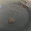 Collar Colgante Corazón Hueco de Circonita, Lujo Ligero, Moda de Alta Gama, Cadena Sencilla para Clavícula, Diseño Único, Joyería de Nicho para Mujeres