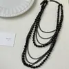 Colar de Corrente de Bolas Escuro Multi-Camadas de Luxo Leve Design de Moda Feminina Colar Empilhado Design de Nicho Corrente da Clavícula