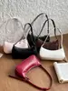 Bolso de axila estilo coreano nuevo 2026, con un diseño relajado, de color liso y minimalista, un bolso cuadrado pequeño moderno y único que se puede llevar como bolso de hombro o bolso cruzado