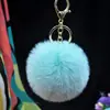 Al por mayor en stock Bola de pelo de imitación de conejo Rex de 8 cm llavero colgante lindo para mujer bolso de coche teléfono móvil colgante de felpa