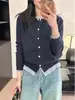Cárdigan de punto falso de dos piezas para mujer, nuevo suéter de moda 2026, top de diseño holgado para otoño e invierno