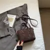 Bolsa Balde Simples Elegante para Carregar na Mão Estilo Coreano para Mulheres 2025 Nova Tendência Coreana Ins Bolsinha de Ombro Único Transversal