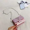 Bolsa Feminina 2026 Outono Nova Chegada Design de Nicho Personalidade Moda Pequena Quadrada Tendência de Mão Ombro