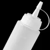 Botella exprimible con tapa y escala, botella para condimento de ketchup, botella para ensalada, botella exprimible para mermelada y crema, botella con boquilla puntiaguda