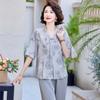 Traje de Madre de Manga Corta Estilo Chino 2025 Verano Nuevo Moda para Mediana Edad y Ancianos Tallas Grandes Tops Conjunto de Dos Piezas para Suegra