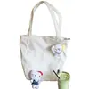 Bolsa de lona estilo japonés de alta calidad y elegante, perfecta para el uso diario, con gran capacidad, adecuada para estudiantes y viajeros, y se puede llevar como bolso de hombro.