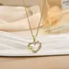 Colar de Aço Titânio de Nova Luxury de Nicho Transfronteiriço para Mulheres, Acessórios de Corrente para Clavícula com Zircônia de Design de Ponta, Atacado de Joias Femininas
