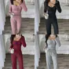 Ropa casual de verano 2026 transfronteriza europea y americana: top de encaje con retazos y manga acampanada, y pantalones largos de pierna ancha de cintura alta