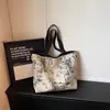 Nova Bolsa Nicho para Mulheres Primavera 2026, Bolsa de Ombro Casual de Grande Capacidade, Bolsa Tote para Comutação de Estudantes Universitários para Mulheres