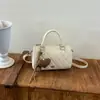 Moda Otoñal 2026 Transfronteriza Versátil Bolso Boston Acolchado para el Trabajo de Mujer Bolso de Mano de Moda Bolso Cruzado