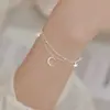 Pulseira Fangxing S925 Prata Esterlina Estrela e Lua Camada Dupla para Mulheres Verão Nova Tendência Pulseira Nicho Acessível Luxo Joias de Mão de Alto Padrão Atacado
