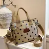 Bolso de mano de lunares elegante transfronterizo para mujer, nuevo bolso casual de tela Oxford de gran capacidad para el hombro y cruzado