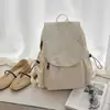 Mochila color crema para mujer, nuevo estilo 2026, simple, a la moda, gran capacidad, bolso de doble hombro, diseño de nicho, versátil para el trabajo, se puede llevar cruzado