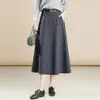 Elegante saia midi xadrez retrô para mulheres, nova coleção outono/inverno 2026, saia de cintura alta em linha A com caimento que valoriza a silhueta