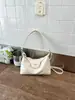 Bolso cruzado pequeño retro moderno transfronterizo para mujer, modelo nuevo para el trabajo y los desplazamientos, bolso de axila con diseño vintage de nicho