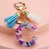 Llavero con 26 letras en inglés, estilo europeo y americano, con borlas de cristal acrílico transparente, adorno para bolso, pequeño regalo.