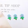 Decorações de unhas florais de cor sólida, com tema de primavera e versáteis, apresentando designs delicados e tridimensionais de folhas e flores, adequadas para esmalte, capas de celular e artesanato em resina.