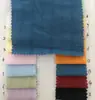 Xiaojun textil tela nueva china gasa de algodón jacquard rayado tela vestido camisa ropa para niños