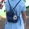 Colgante de Anillo de Madera Tejido de Color Accesorios para Mochila Escolar Venta al por Mayor Colgante de Anillo de Madera Colgante de Hilo de Algodón Juguete de Confort Colgante para Cochecito de Bebé