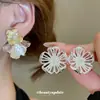 Pendientes Metálicos Calados de Flor de Aguja Plateada Europeos y Americanos Transfronterizos, Pendientes de Moda, Simples, Versátiles, de Lujo Ligero, Pendientes de Gama Alta para Mujer