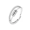 Nuevo producto transfronterizo: Anillo giratorio para mujer, diseño de nicho, anillo giratorio moderno y único, estilo minimalista de moda, lujo ligero