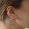 Moda transfronteriza europea y americana arete de cartílago caliente para mujer diseño de circonita microincrustada arete Joker temperamento aretes de hueso de la oreja al por mayor