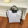 Outono de 2026 Novo Estilo Estilo Ins Versátil Bolsa de Mão Estrela para o Trabalho Moda Feminina Bolsa de Compras de Grande Capacidade Atacado Bolsas Femininas