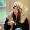 Sombrero de pescador de punto de diseño nicho retro coreano para mujer en otoño e invierno, cálido, con protección para las orejas, de lana, tipo baotou, para el frío, a la moda