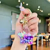 Llavero Creativo Serie Océano Relleno de Aceite Pez Payaso Estrella de Mar Pez Pequeño Colgante de Bolso Decoración de Llavero