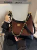Bolso cubo único con patrón de diamantes para mujer, nuevo otoño 2026, moda vintage de alta gama, para hombro, cruzado y de mano