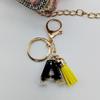 Nuevo llavero de resina y metal con personalidad creativa ins, llavero de 26 letras, colgante de moda de punto al por mayor