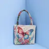 Bolsa de mano bordada con hilo de oro de estilo étnico, bordado a doble cara, bolsa tejida de estilo Harajuku transfronteriza con dibujos animados