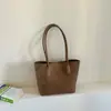 Bolso de cubo casual retro de gran capacidad para mujer, nuevo modelo de otoño 2026, bolso de hombro versátil y elegante