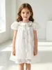 Vestido de verano para niña de Amazon transfronterizo, cuello de muñeca, manga corta, color liso, con adornos florales en 3D, moderno, dulce y lindo